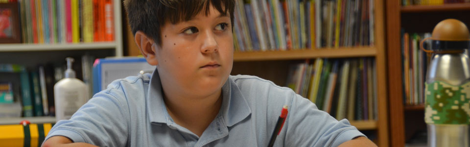 Fifth grade student in class